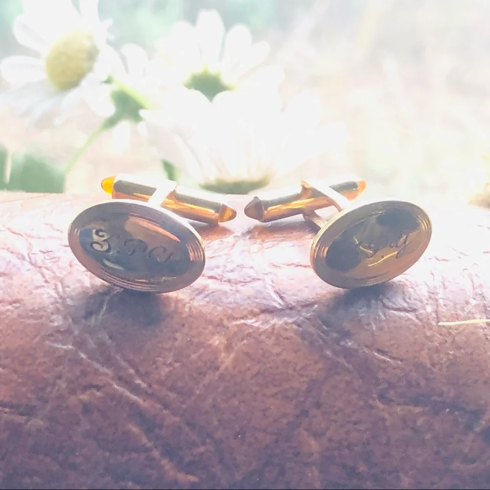 Antique Krementz engraved gold oval amber accent cuff links